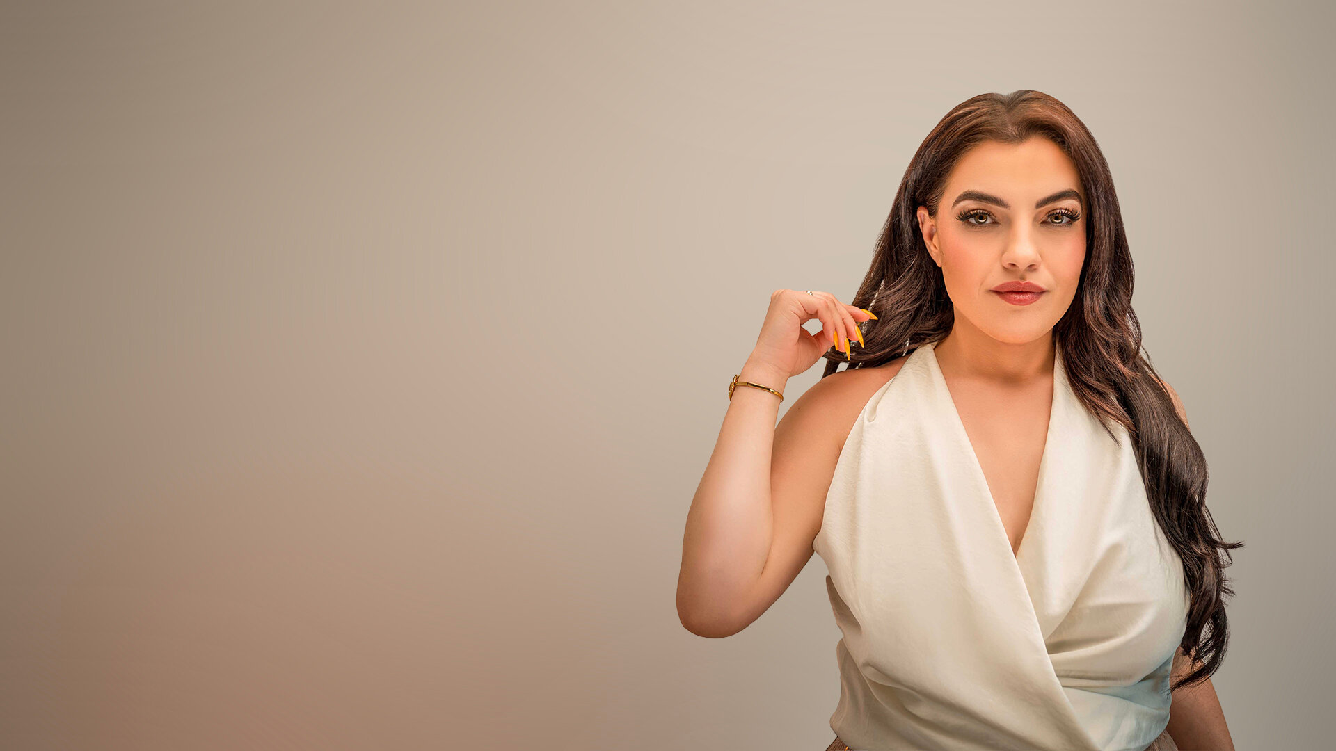 Confident woman in a white wrap top, portrait photography session in Chicago